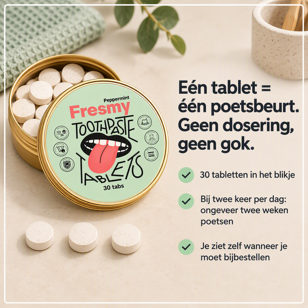 Fresmy Tandpasta Tablets blikje met losse tabletten op tafel